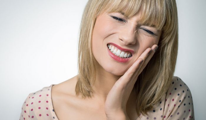Đau răng là triệu chứng mọc răng khôn thường gặp nhất